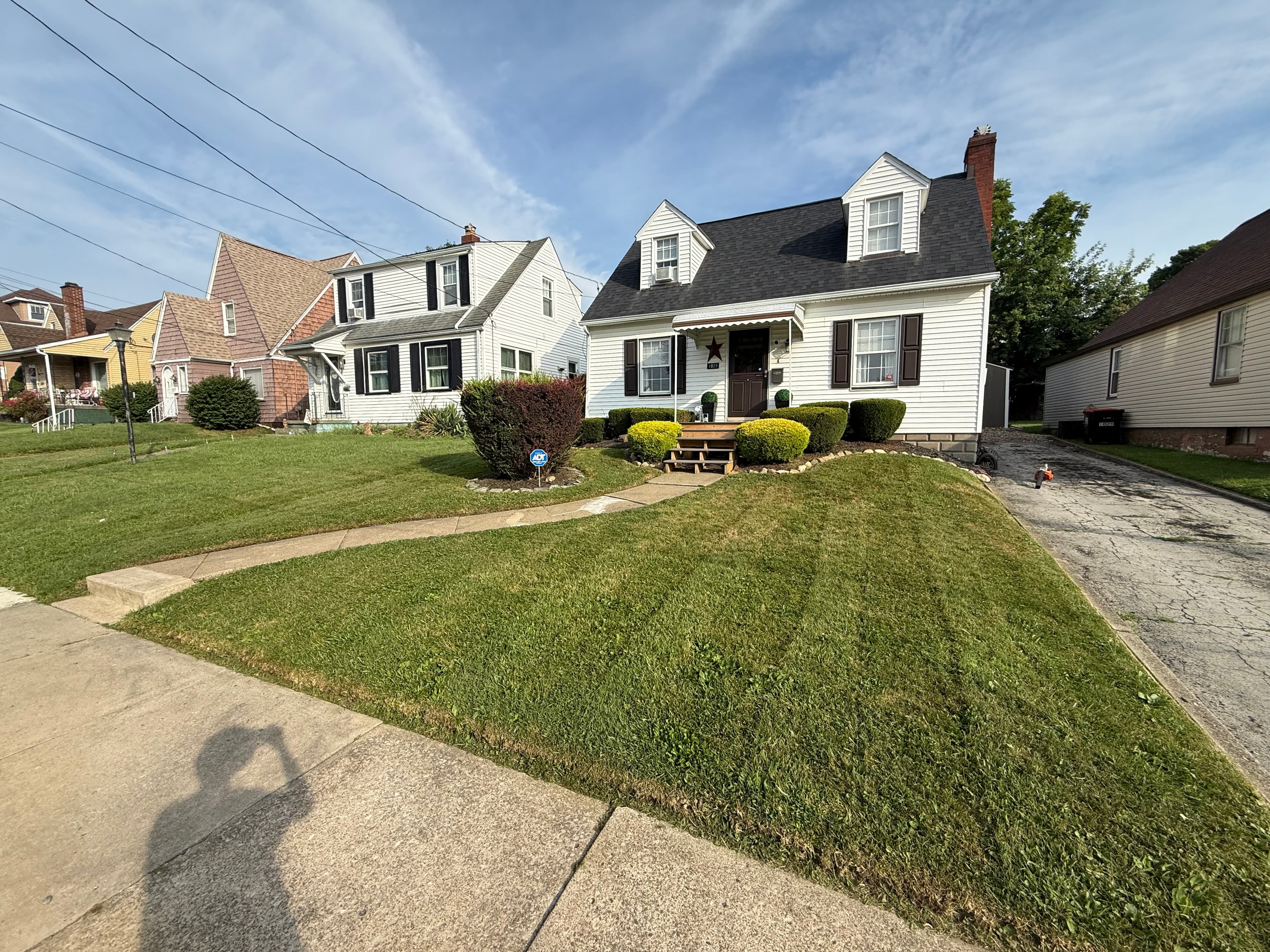 Freshly mowed lawn with clean stripes